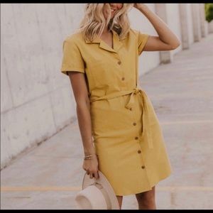 Mustard button dress with tie.